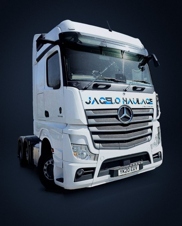 A white Mercedes Actros tractor unit in Jagelo Haulage livery, registration YK20 EUV.